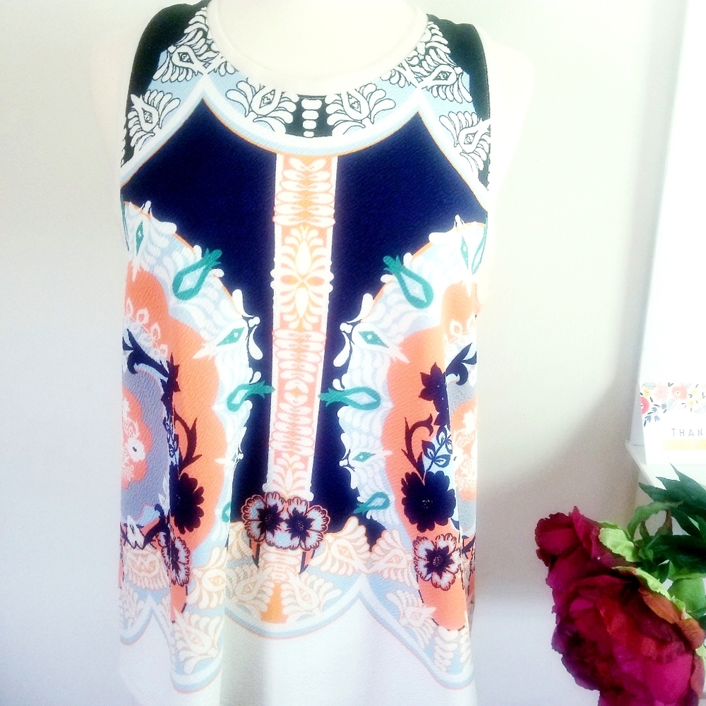 Anthropologie blue and white swing graphic top Size Large